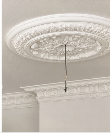 Decorative ceiling rose and cornice